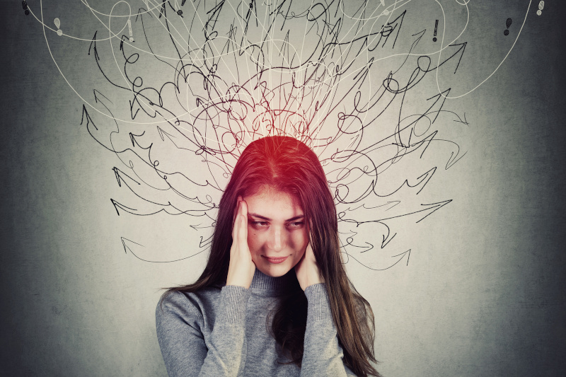 Fatigue young woman student keeps hands to her temples, suffers anxiety, stress depression feeling. Exhausted teenage girl mess in head, migraine and headache mental health problem, dementia disease. Test Therapist