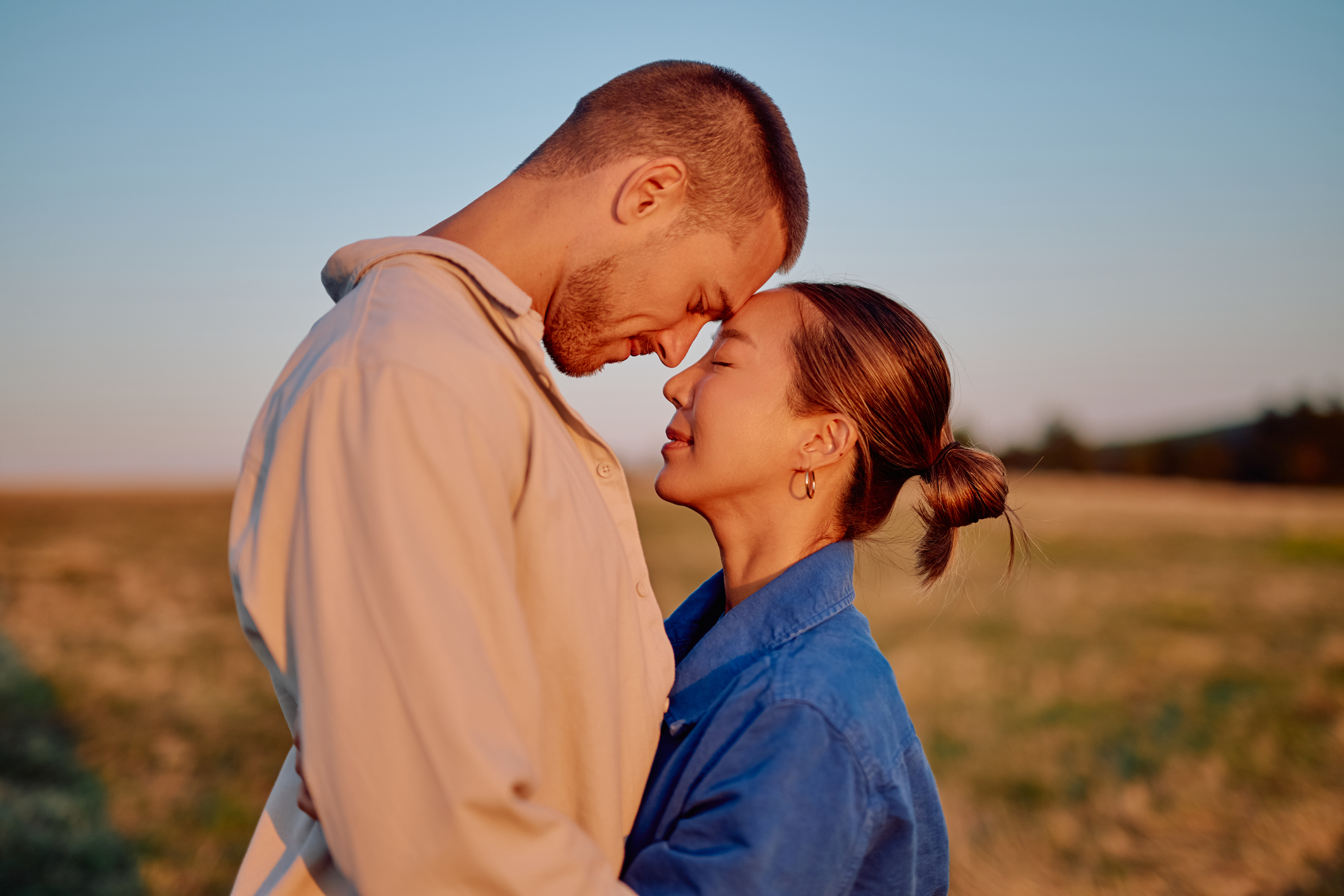 man and woman holding hands